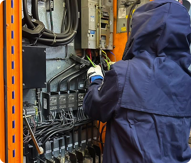 Qualified person troubleshooting with proper PPE